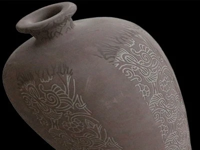 Laser engraving on ceramic bottle